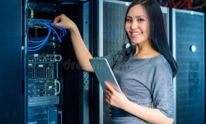 engineer-businesswoman-network-server-room-young-tablet-0001